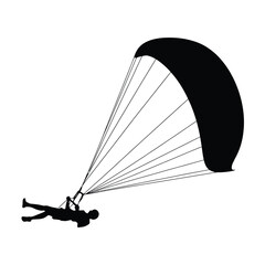 Silhouette of a Paraglider Preparing for Flight in Black and White