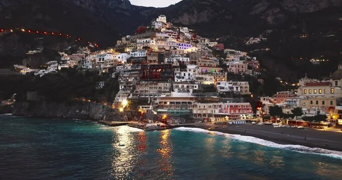 Aerial view of Positano. The famous colorful houses at night with light. Amazing architecture on the scenic Amalfi Coast, Italy