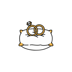 Obraz premium Two golden rings rest on a small, decorative pillow, ready for a special moment.