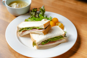 Ham Sandwich and Salad Breakfast on White Plate / ハムサンドとサラダの朝食

