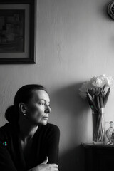 chronicler portrait on left side of frame hands out of view expressing calmness