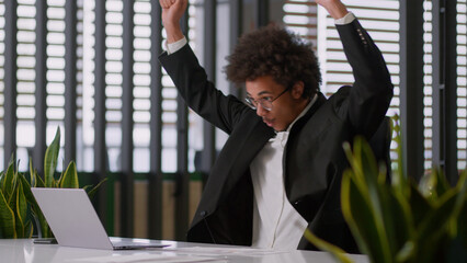 Happy champion winner successful African American business man businessman guy male employer...