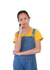 Portrait of happy Asian girl child using wireless headphones enjoy with music isolated on white...