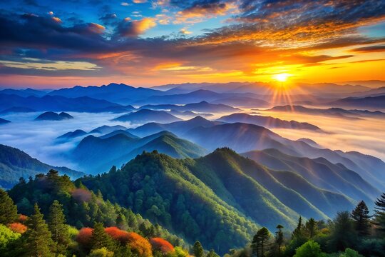Breathtaking sunrise over misty mountain range scenery with lush green forest