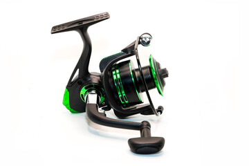 Green fishing reel with fishing line isolated white background, ideal for outdoor activities and sports. Photos from all angles and sides.