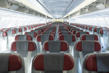 Inside empty wide body passenger airplane cabin