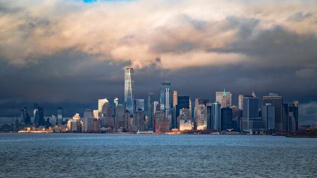 Lower Manhattan Skyline with One World Trade Center Seen Across the Hudson River - Powered by Adobe
