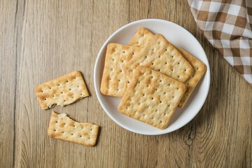 Cracker in a white  plate on wooden background table