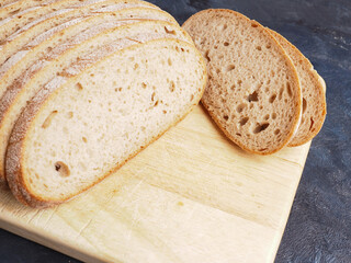 Tasty organic rye bread on a wooden cutting board