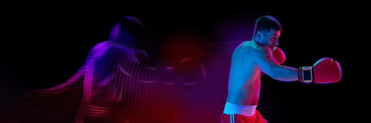 Muscular male boxer in motion delivers a powerful punch with vivid neon light streams showing...