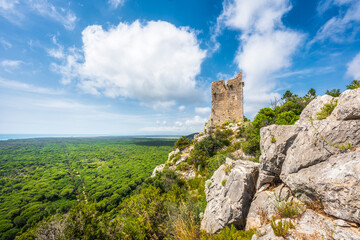 Tower of Castelmarino and panoramic view of Parco della Maremma regional natural park. Tuscany,...