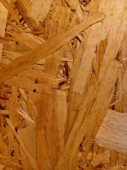 Close-up view of wood texture showcasing natural patterns and colors found in engineered lumber...