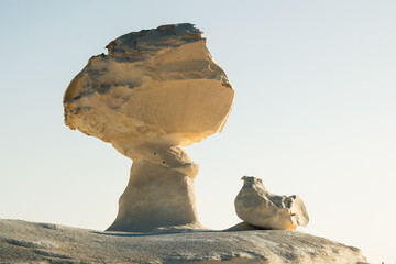 White rock formations and sand dunes in Egypt's White Desert, natural desert landscape	