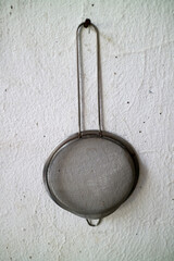 Stainless Steel Mesh Strainer Hanging on Wall