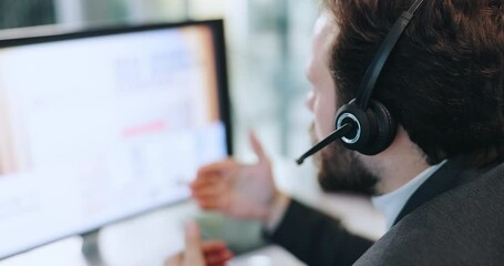 Businessman, agent and talking with headset on computer for customer service at call center. Man, back or consultant with mic for communication, online advice or virtual assistance at office desk