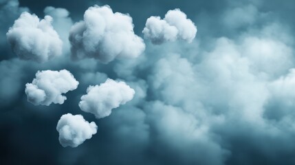 Fluffy white clouds float in a misty, blue sky creating a serene and dreamy atmosphere.