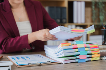 Paperwork Processing: A focused professional navigates a structured world of documents and...