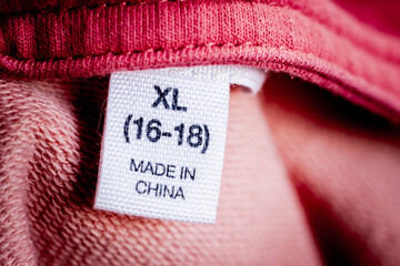 Extreme close-up of a textile label marked 