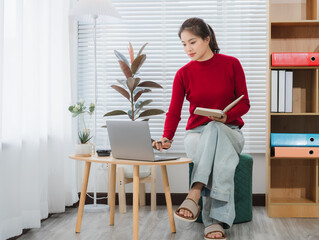 Work-life balance: A focused individual adeptly manages her professional and personal life,...