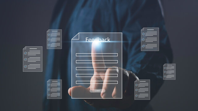 Hand touching digital feedback form interface on screen, representing online survey, customer feedback, user experience, data collection, and digital evaluation system.