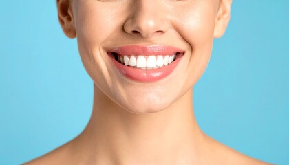 Obraz premium Young woman displaying perfect healthy smile with focus on beautiful teeth after professional whitening procedure
