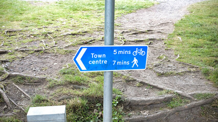 sign pointing to town center