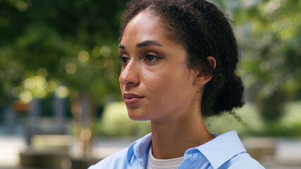 Portrait calm serious face ethnic African American student girl female business woman businesswoman...