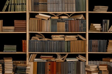 Stacks of many books on a shelf and table. Concept of library, reading, old classic literature,...
