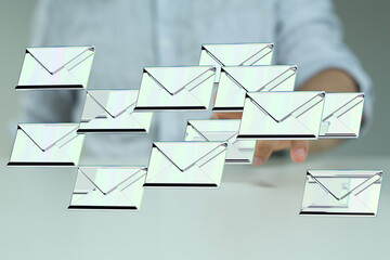 Person digitally handling a large number of emails.  Efficient inbox management.