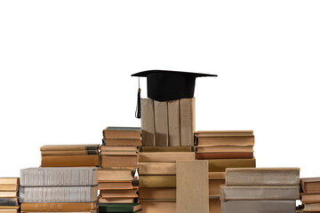 Stacks of books, Square academic cap or graduation hat. Concept of education, knowledge,...