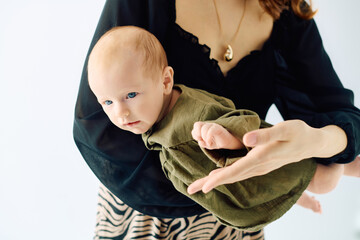 Joyful moments shared between a young mother and her adorable child in a modern setting