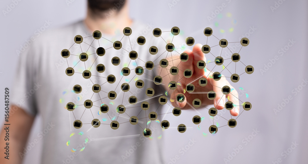 Aufkleber Person touching a holographic network of files, illustrating data connection and management.