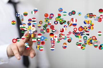Image of world flags floating, symbolizing global connection and international business.