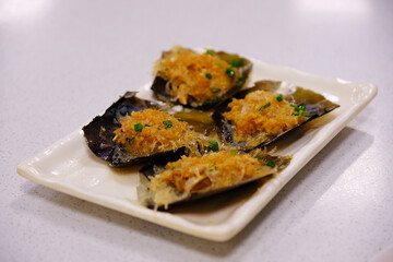 plate of steamed scallops seafood