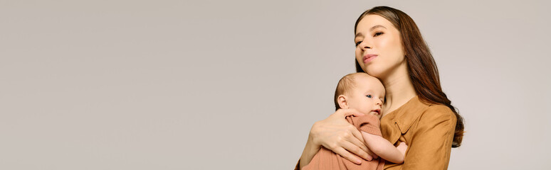 Embracing the bond of motherhood with a loving young mother and her precious child