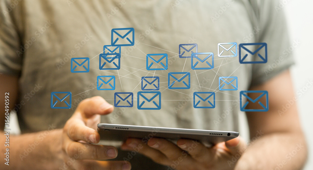 Poster person using tablet to manage emails. efficient communication & digital workflow.