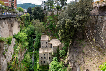 Fototapeta premium Sorrento. Vallone dei mulini. The ruins of the old mill renovated at the bottom of the valley among thick vegetation. Lost places. Italy