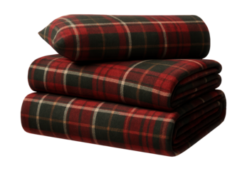 Flannel sheets with a plaid pattern, ideal for keeping warm during winter nights in a cottage.