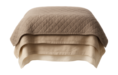 A multi-layered, textured bedspread in a neutral palette, designed to complement a contemporary style in a loft apartment.