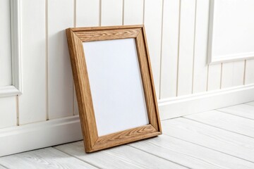 Realistic wooden poster frame mockup on white wall background in minimal interior room. Ideal for design showcase, art presentation, home decor, or modern gallery display.