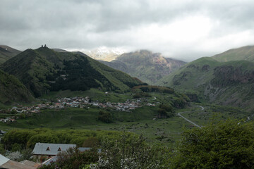 Misty View of Kazbegi Village in Spring