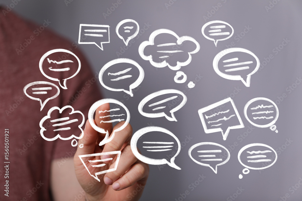 Poster image depicting communication and interaction, showing hand and speech bubbles.
