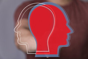 Stock photo depicting overlapping head silhouettes, symbolizing diverse viewpoints and collaboration.