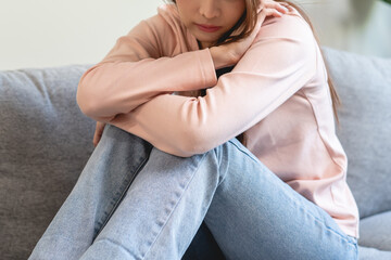Depression in teenage concept, Young women covering her face feeling anxious and unhappy lock...