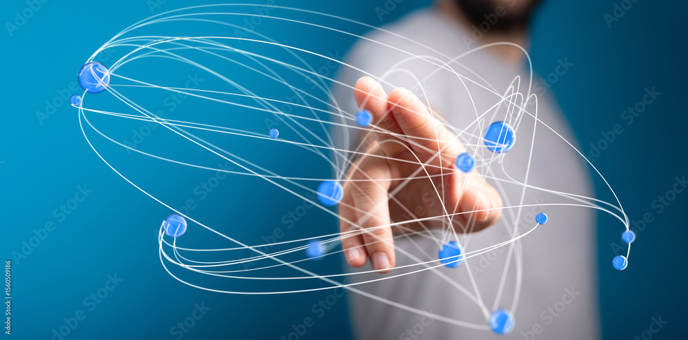 Aufkleber Abstract image of a hand interacting with a network of digital nodes, representing global connection and data.