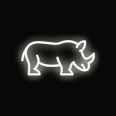 Neon sign illustrating the profile of a rhino walking on black background