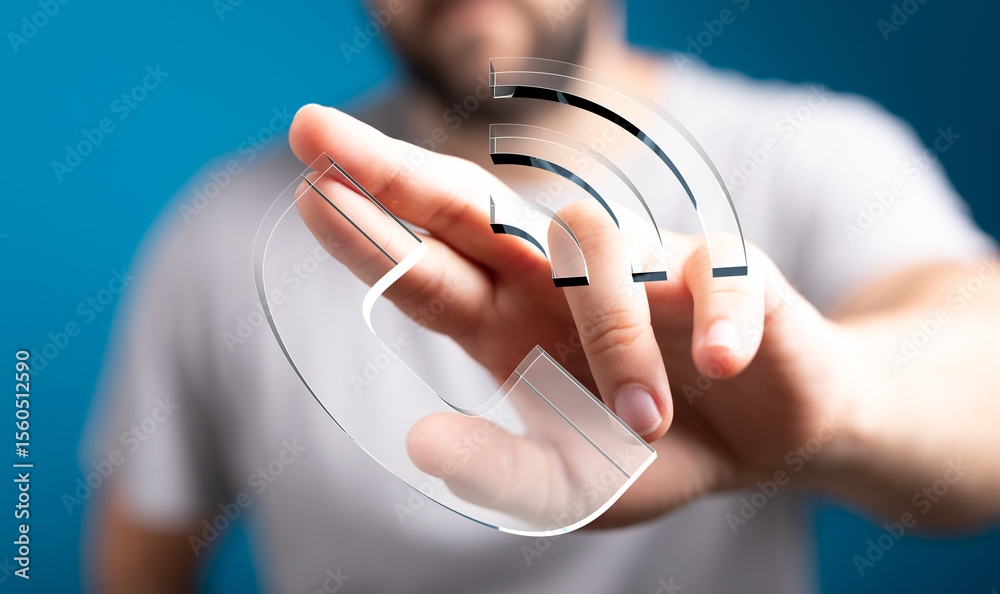 Poster Stock photo of a person's hand interacting with a translucent phone icon and wifi signal, representing communication and technology.