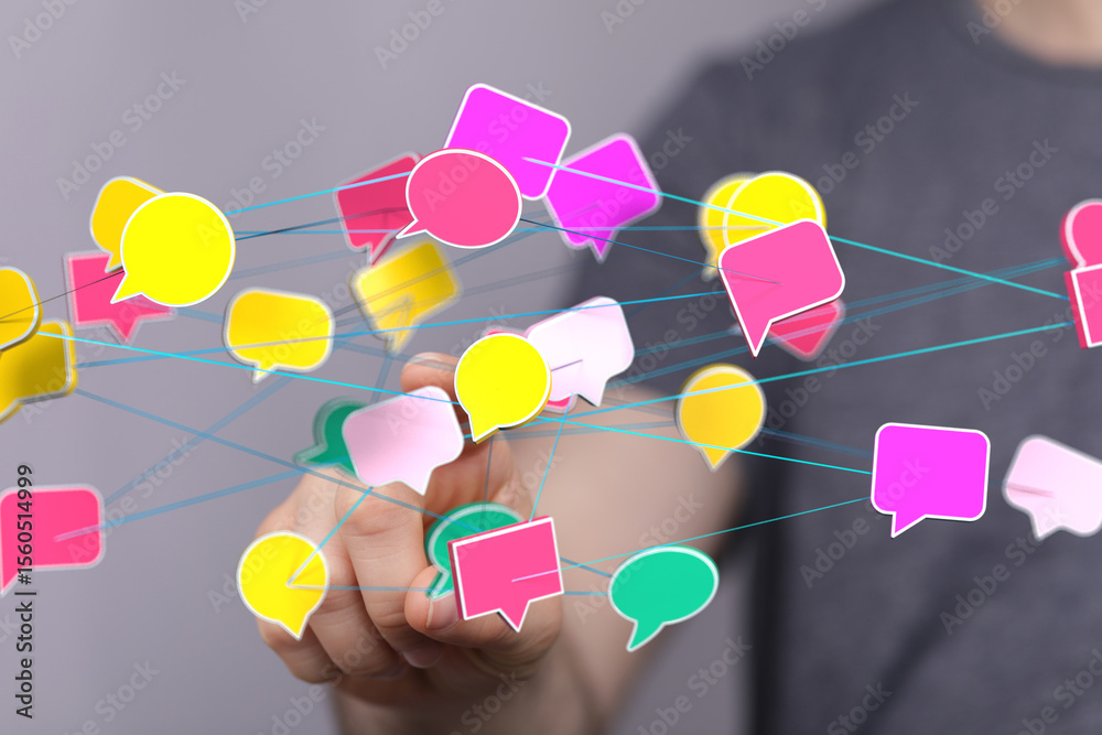 Poster abstract image of interconnected speech bubbles representing communication and networking.