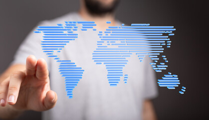 Man interacts with a digital world map, symbolizing global connectivity and technology.