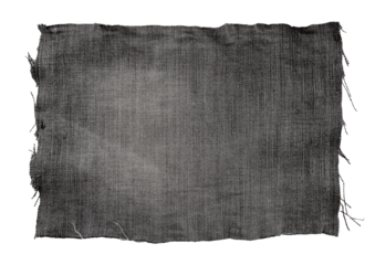 Piece of black torn denim on a white background. Denim texture